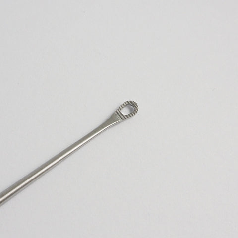 close up of the shapleigh ear curette and serrated tip